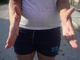 VARIABLE DIMENSIONS (2008), A VIDEO SURVEY WHERE CUBAN WOMEN ARE ASKED ON THE STREET TO INDICATE WITH THEIR HANDS THE GENERALLY HUGE DIMENSIONS OF THE PENIS THEY PREFER. IMAGE RECREATED.