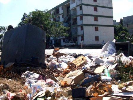 Reeking garbage, which produces maggots, flies and rats can be found in some Havana neighborhoods just a few yards away from people’s homes.
