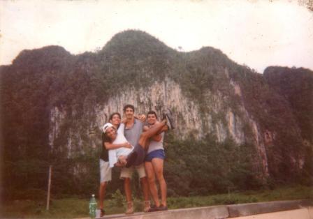 Dago and friends and one of Viñales famous limestone outcrops