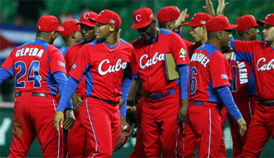 Cubans celebrate crucial opening victory over Brazil at the World Baseball Classic III.