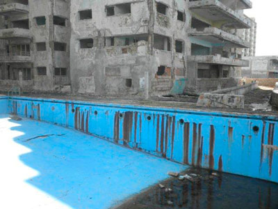 Swimming pool and part of the building.