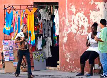 Establishment selling clothes in a neighborhood in Havana. The Cuban government will begin to shut these businesses down as of 2014. 