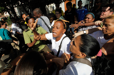 Cuban dissidents being detained on Human Rights Day. Photo: www.aljazeera.com 