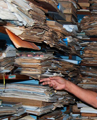 The computerization of society has yet to arrive. Most public documents are still paper files.