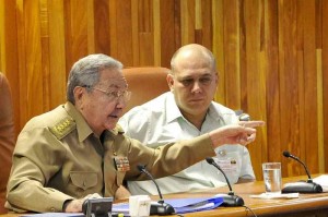 Raul Castro shown here with Public Health Minister Dr. Roberto Morales Ojeda.