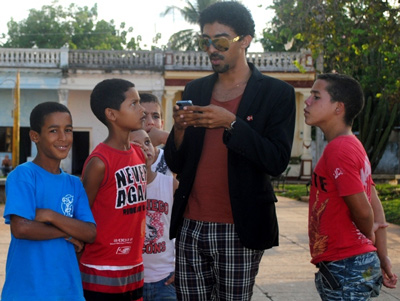 Actor Jazz Vila with local kids.