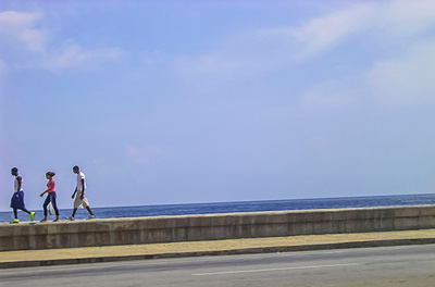 Photo on the Havana Malecon Seawall by Yamila Mayet