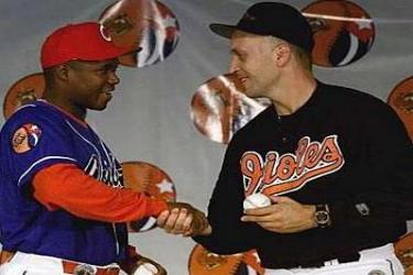 Omar Linares and Carl Ripken when the Orioles played in Cuba back in 1999.  