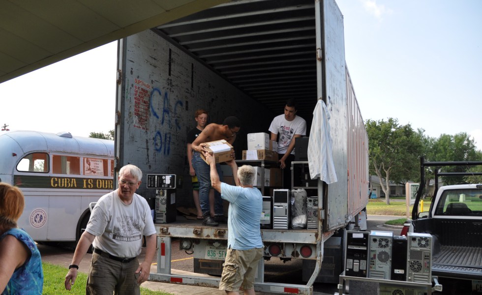 Loading up donations for the 2015 Pastors for Peace Caravan to Cuba.