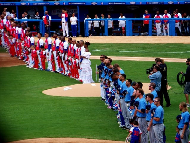 Team Cuba and the Tampa Bay Rays before the game.