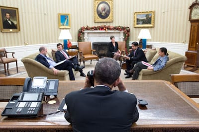 Barack Obama speaks to Cuban President Raúl Castro from the Oval Office on Dec. 16, 2014. White House Photo by Pete Souza.