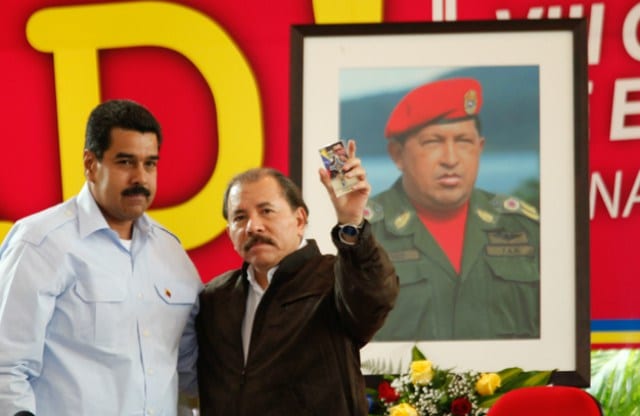 Nicolas Maduro, Daniel Ortega and the image of Hugo Chavez.
