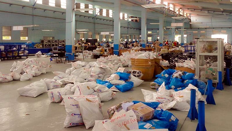 Packages and other mail at a warehouse of Correos de Cuba.