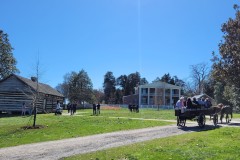 On the left Alfred's cabin with the mansion in the background.