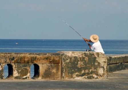 People fish in Cuba but they can’t legally sell their excess catch to a willing market.  Photo: Bill Hackwell
