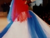Luz Maria exhibits a wedding gown with the colors of the Cuban flag.