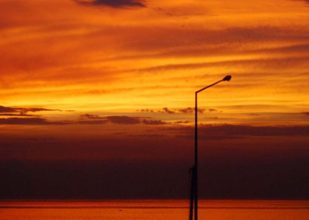 Sunset on Havana’s Malecon seawall.  Photo: Caridad