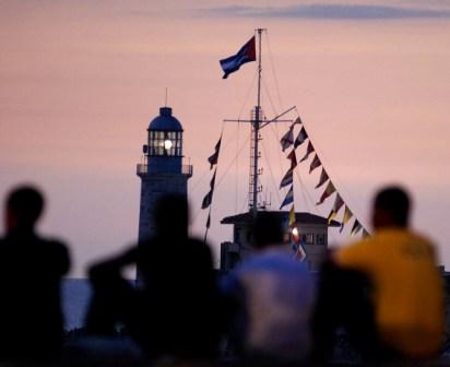 Watching the ships come into Havana Bay. Photo: Caridad