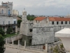 The Emblamatic Castillo de la Fuerza, behind is the Morro lighthouse at the entrance to Havana Bay.