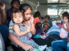 Asylum seekers being transported in the ambulance to a shelter in Mexico