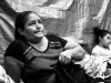 Guatemalan woman waiting to file asylum papers at Immigration on the Mexican side