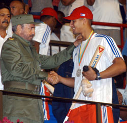 Fidel Castro congratulates Yulieski Gourriel after the first World Baseball Classic in 2006 when Cuba finished second to Japan