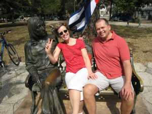 Ottawa Mayor Robert Eschbach and his sister pose next to the John Lennon Statue in Havana