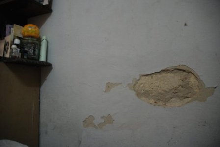 Once I moved in I discovered that the material that covered the walls crumbled off with ease.