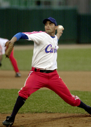  Michael Folch pitched four innings of near-perfect relief to get the win in the final World Port Tournament game against The Netherlands. 