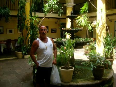  In the indoor patio of a restaurant adjacent to the cathedral in Old Havana.