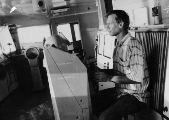 Ron Ridenour at the helm of the Seaweed tanker.