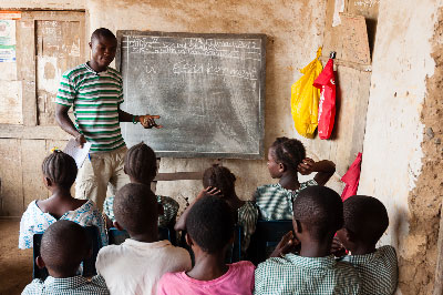Solomon teaching a social studies class in the Mokpangumba school. 