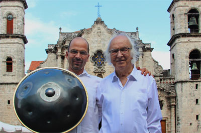 Ananda Stephan and his father Joseph Röösli.  The Swiss percussion instrument is the “hang”