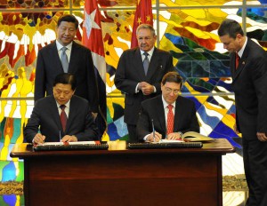 Xi Jinping and Raul Castro oversee the signing of new agreements in July 2014.