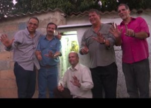 The Cuban Five in front of a modest shrine to Saint Lazarus in El Romerillo, Havana