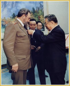 Kim Il Sung pins medal on Fidel during his visit to Pyongyang in March 1986. 