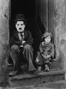 Chaplin and Jackie Coogan in The Kid  (1921).