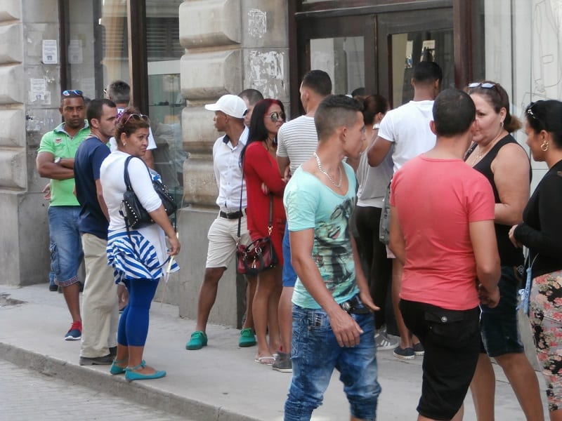 Waiting out in front of the Etecsa phone company office on Obispo Street in Old Havana.  